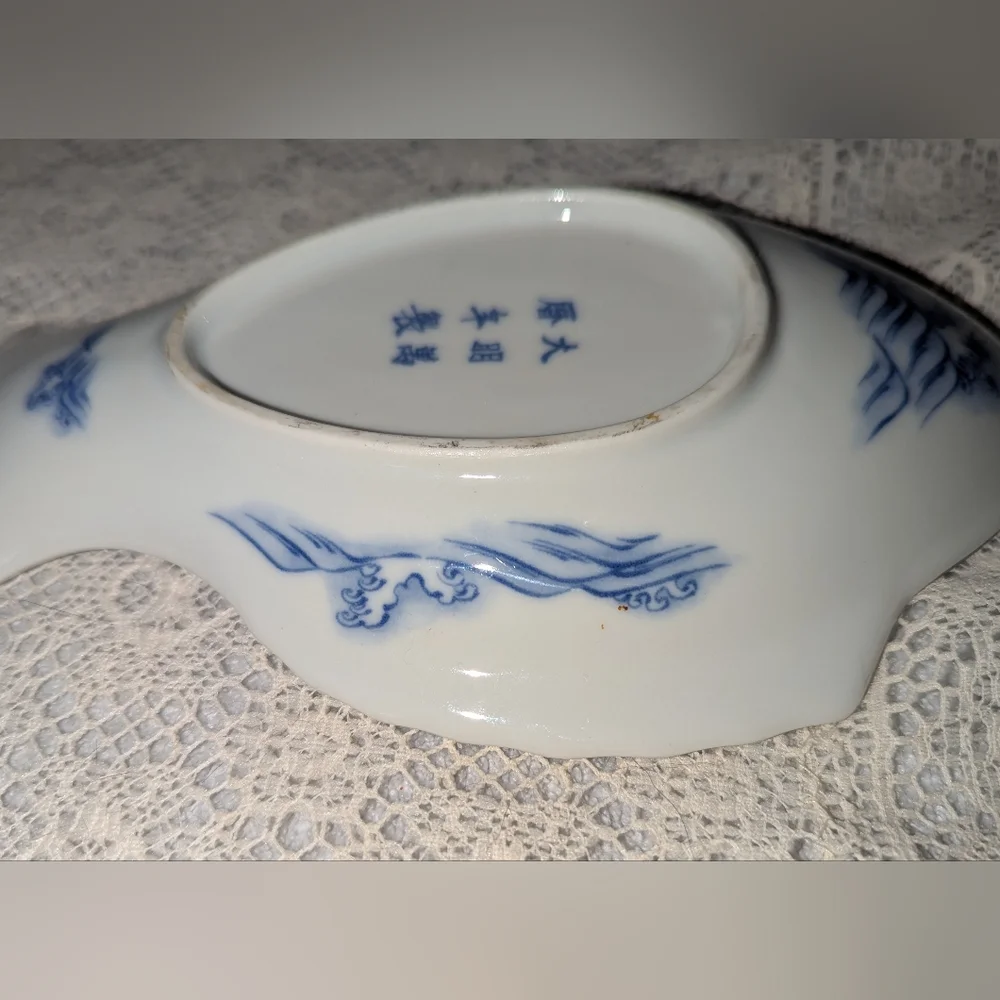 Antique Japanese Arita Imari porcelain blue fish plate.